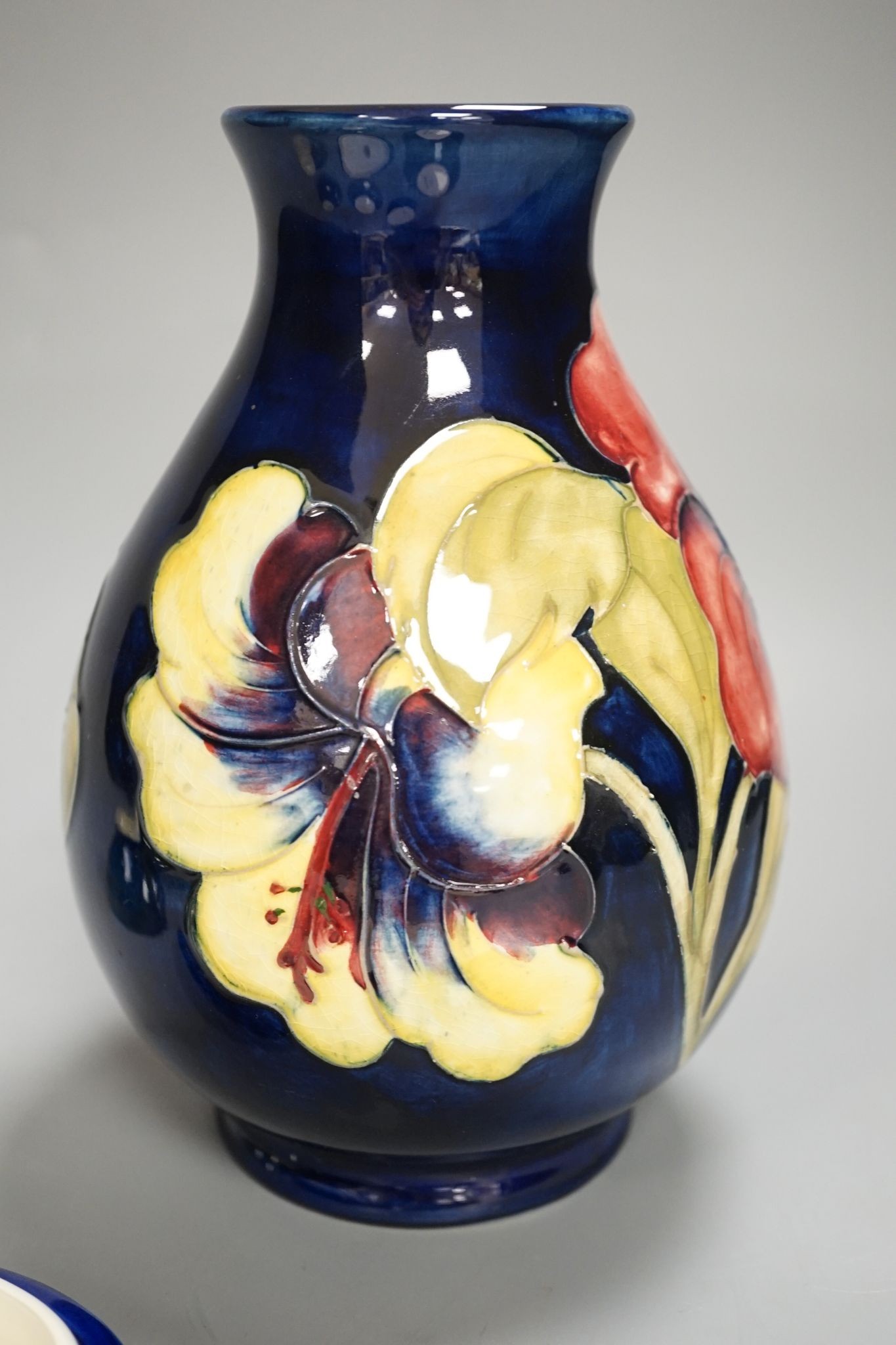 A Moorcroft vase, a similar box, 2 dishes and 2 bowls, Vase 29 cms high.